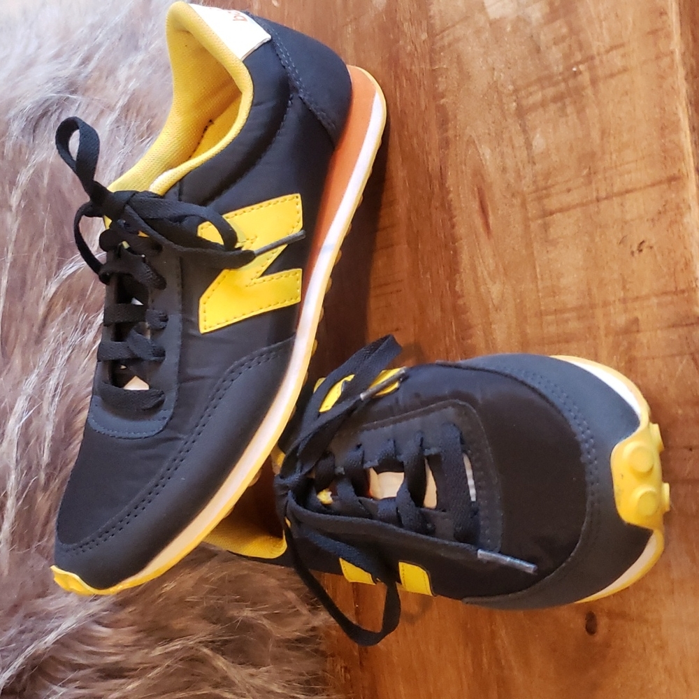 New balance kicks blue yellow size 7